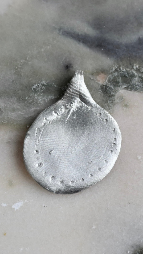 Gift voucher for a group wax talisman workshop.