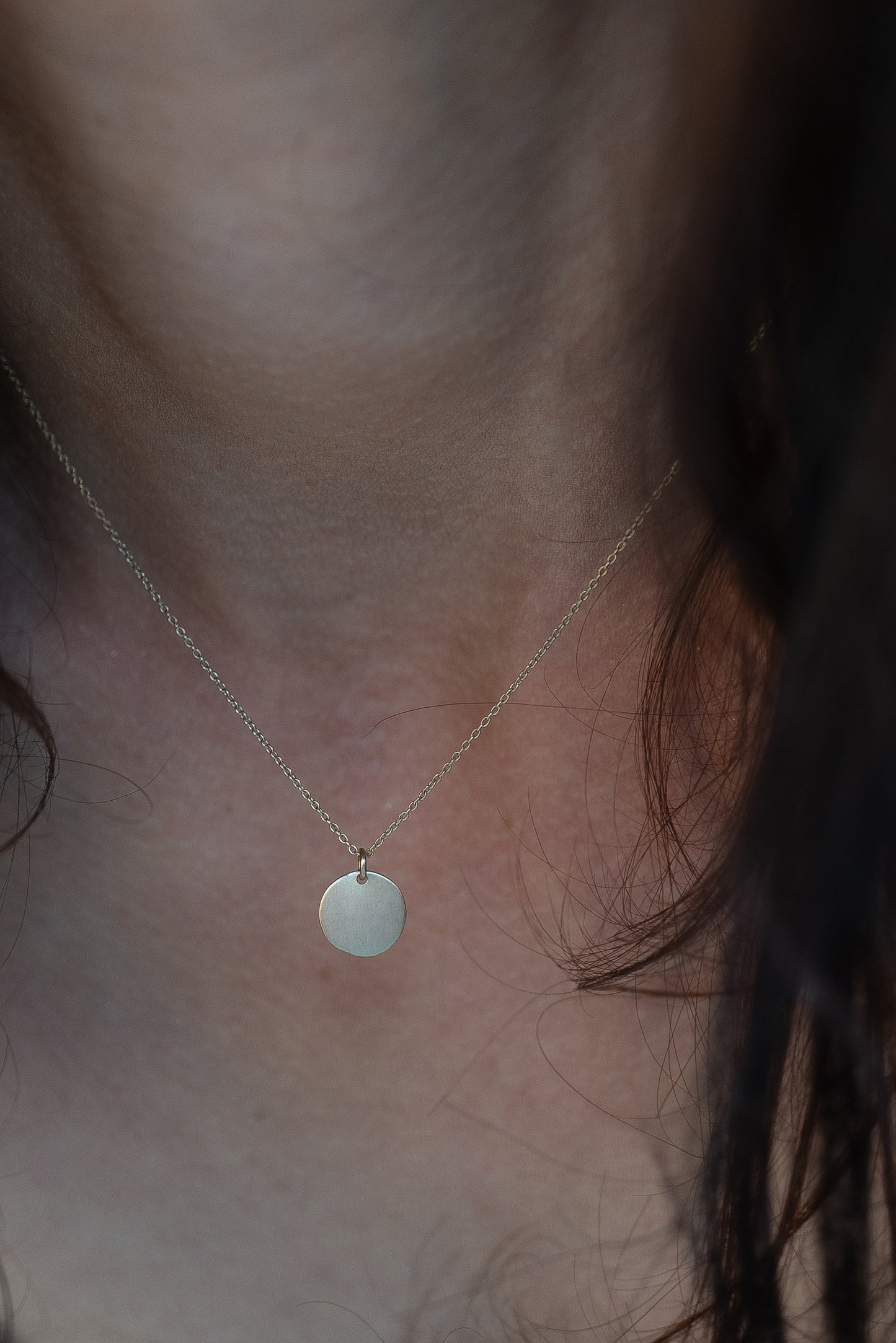 Pure hand hammered, 9 carat disc pendant