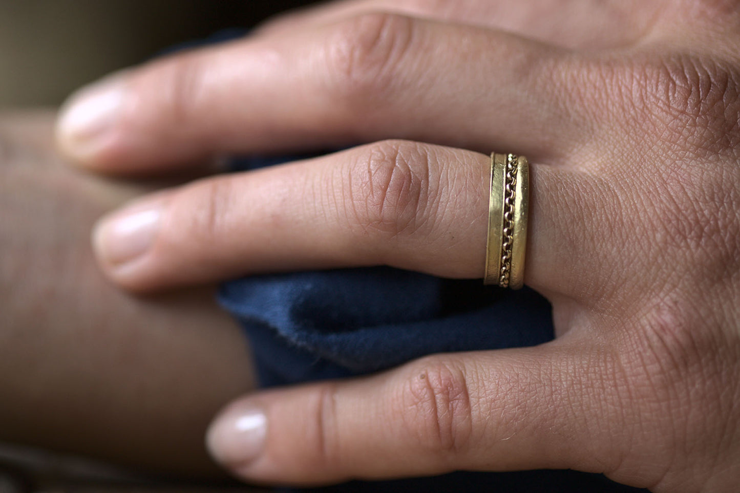 A stack of solid gold rings handmade in the UK